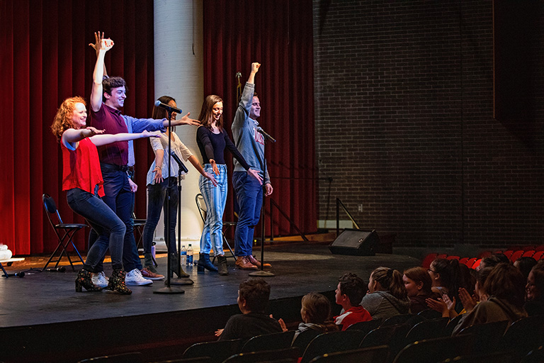 IU Theatre's cabaret group performs for students in Salem, Indiana.