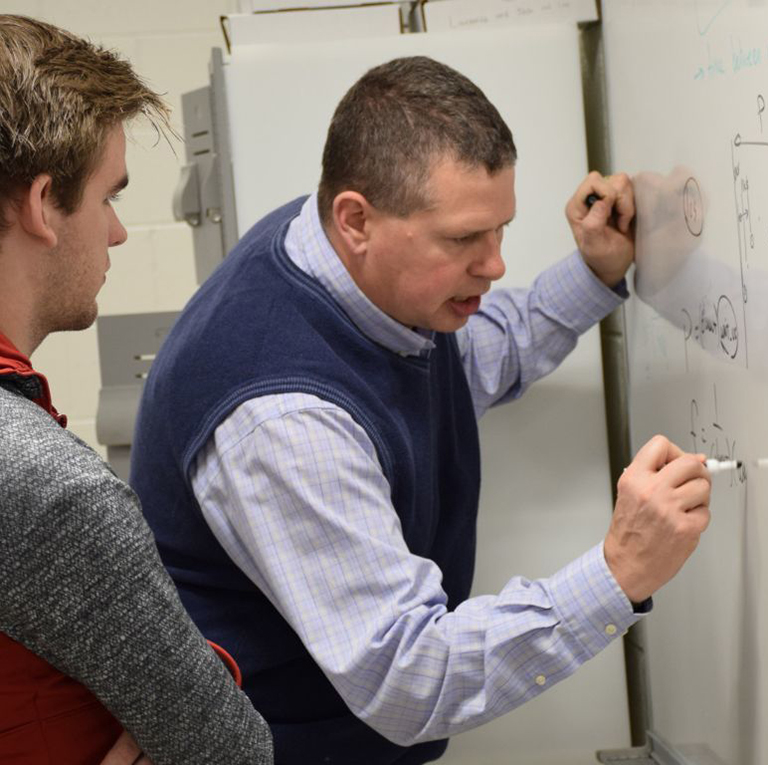 IU Faculty member, Bryce Himebaugh, discusses plans with a student for the Hoosier National Forest Dark Sky initiative.
